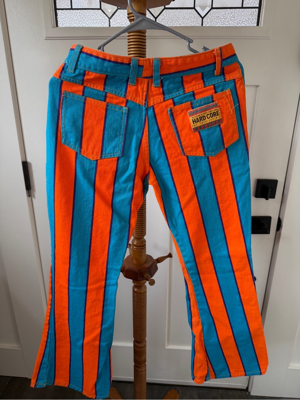 Vintage 1990’s- womens waist 28- Hardcore- Orange and blue flare jeans